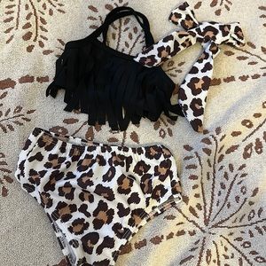 Brand new never with 6-12 month bathing suit